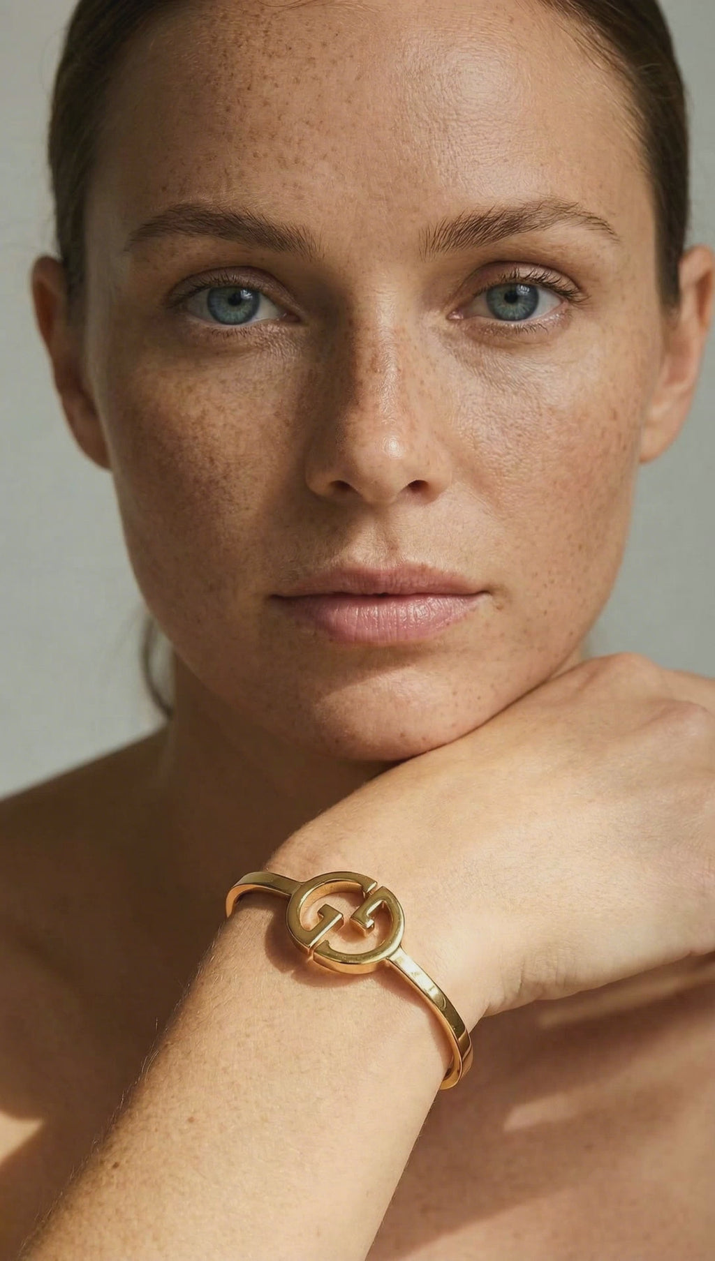 GG Gold Tone Bangle